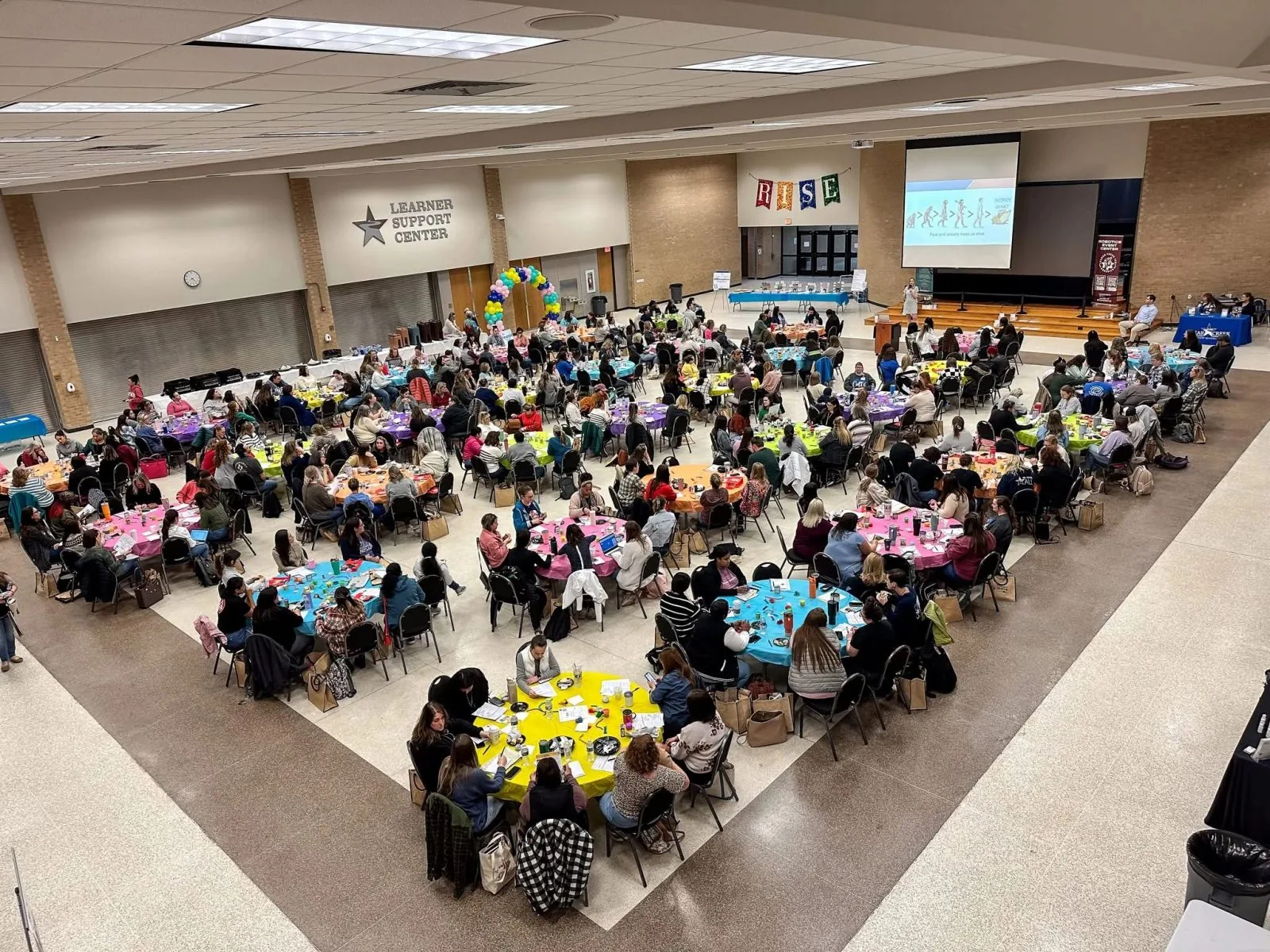 A full audience at the 2025 Empowered to Thrive Conference at the Clear Creek Independent School District Learner Support Center in Houston, Texas, where Drs. Allie and Zach Appenzeller delivered the invited keynote address.